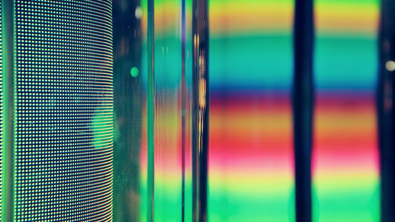 Close-up view of an ultra-high-definition television panel showing vibrant color depth